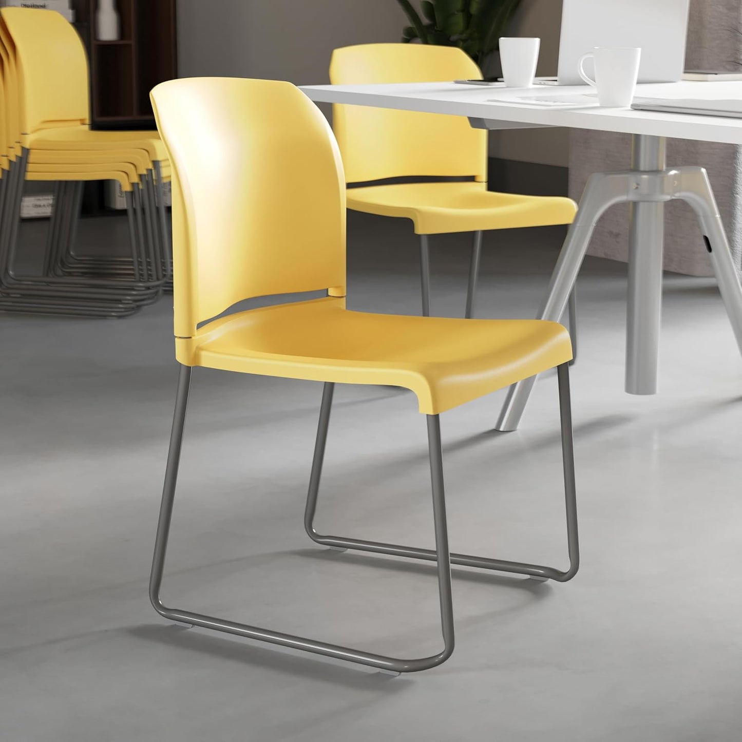 Flash Furniture HERCULES Series 880 lb. Capacity Yellow Full Back Contoured Stack Chair with Gray Powder Coated Sled Base